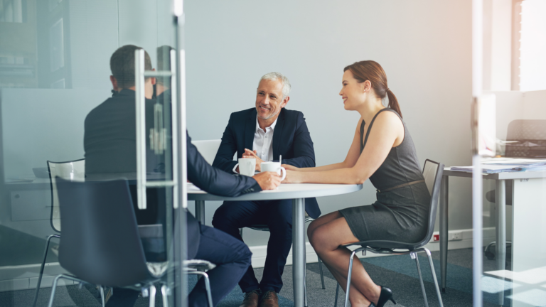 An image of a local CPA helping small business owners with their exit strategy.