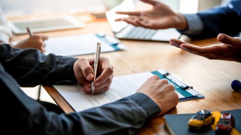 An image of some small business owners discussing what is required to sell their Markham company to an investor