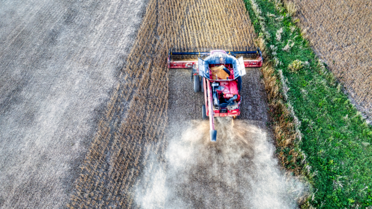 An overhead view of farm equipment working in the field in Durham Region