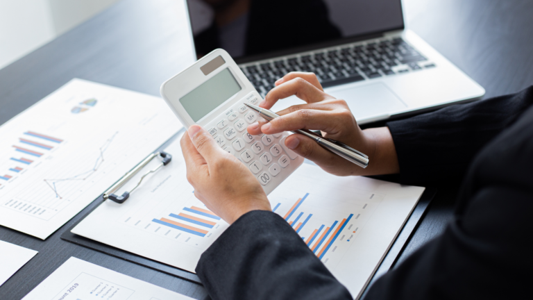 An image of a bookkeeper in Markham who is adjusting entries for a small business in the area.