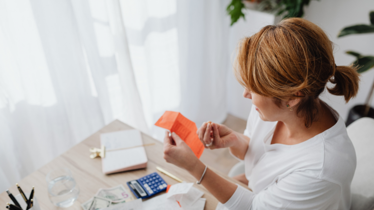 An image of a small business owner in North York who is calculating depreciation for her small business.
