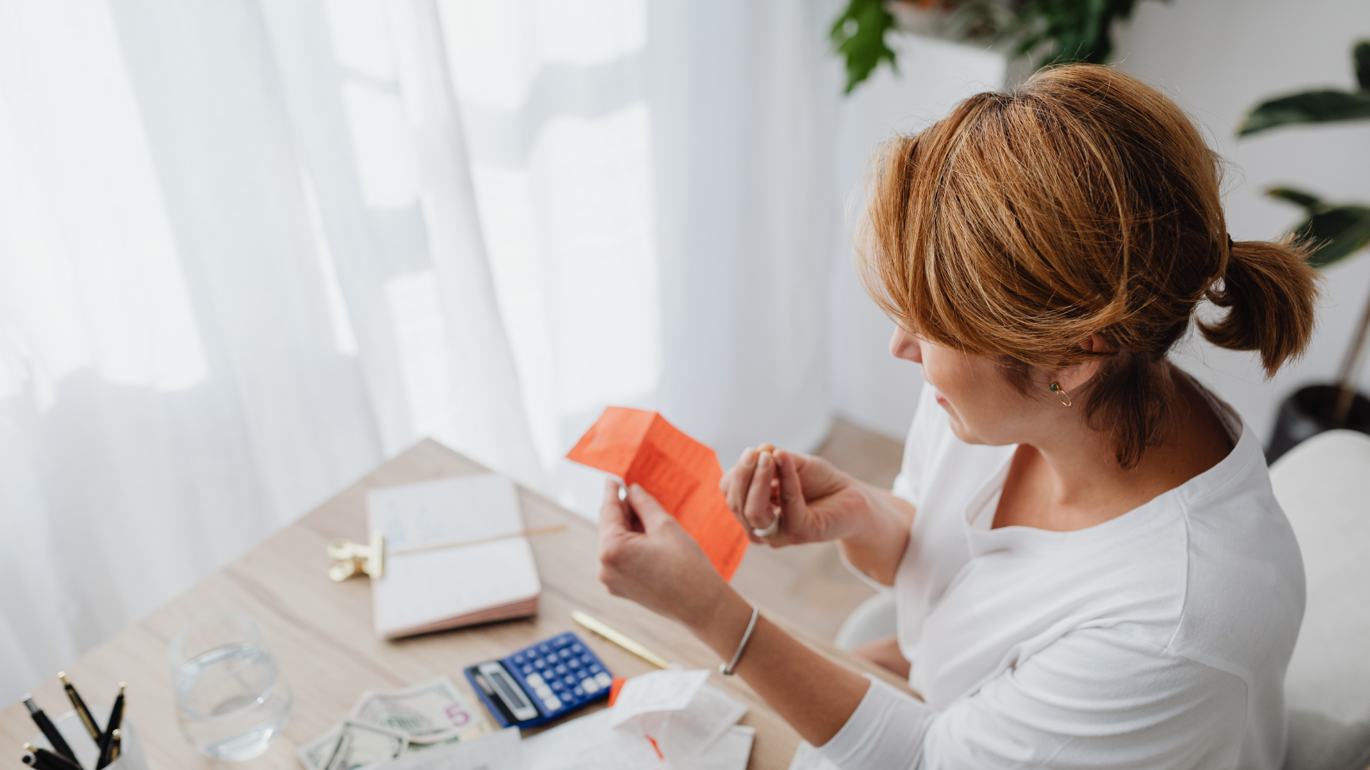 An image of a small business owner in North York who is calculating depreciation for her small business.